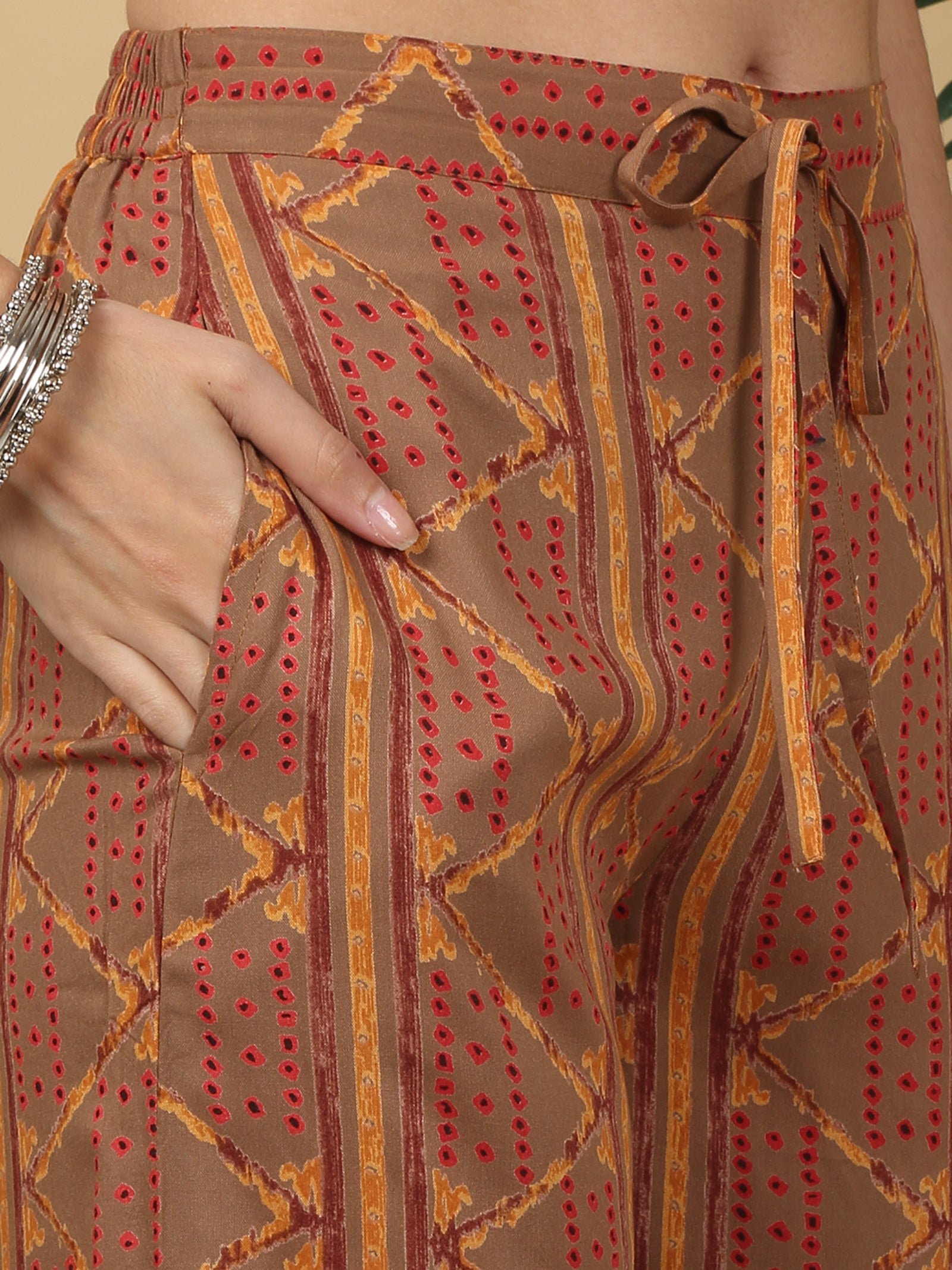 Maluka Women’s Brown Floral Print Rayon Foil Kurta Pant Set