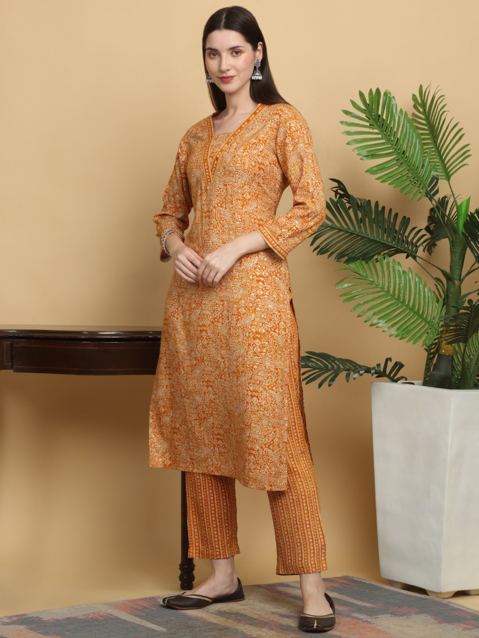 Maluka Women’s Mustard & Red Ethnic Motif Rayon Mirror Work Kurta Set