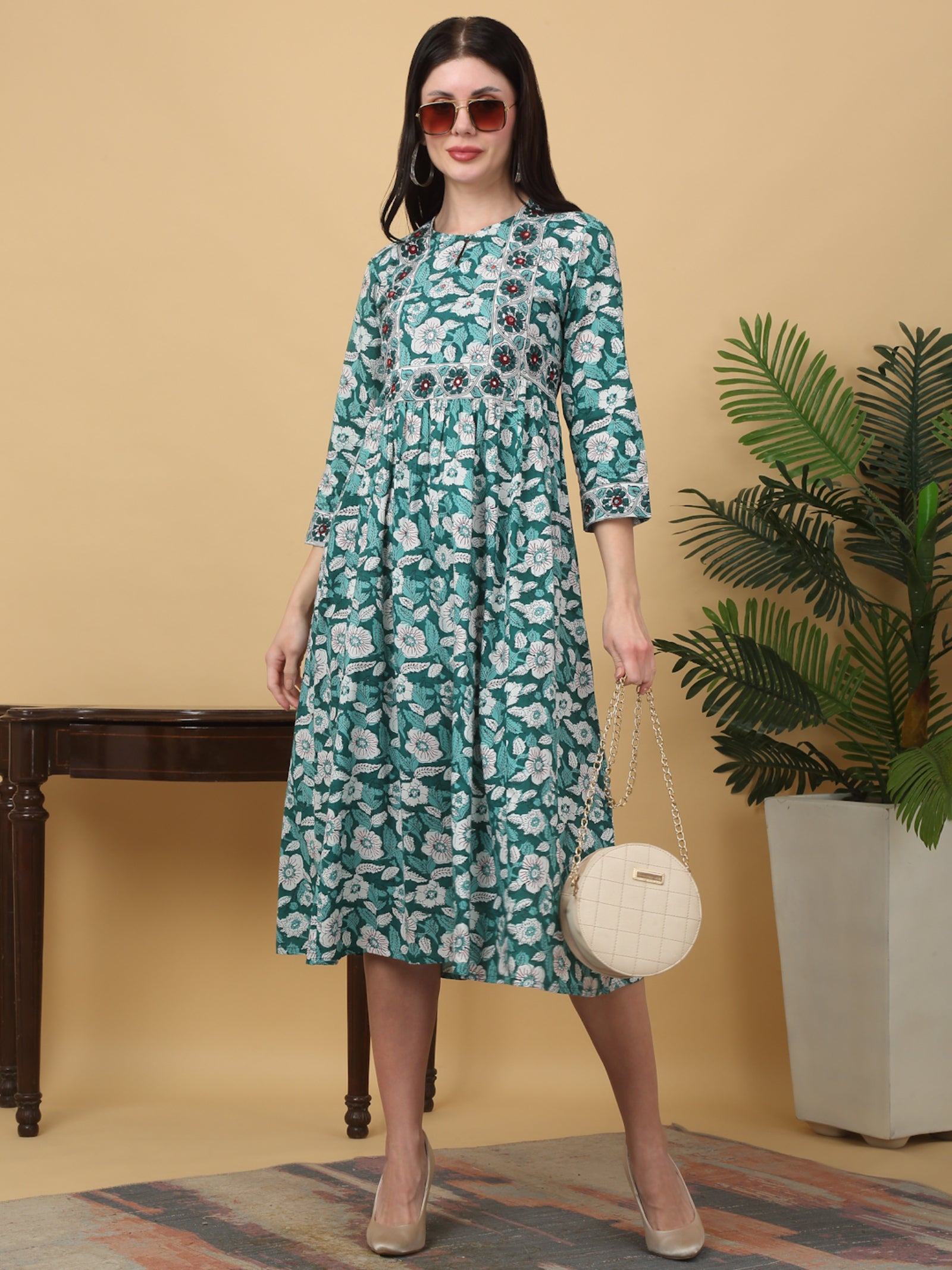 Maluka Women’s Teal Floral Cotton A-Line Kurta