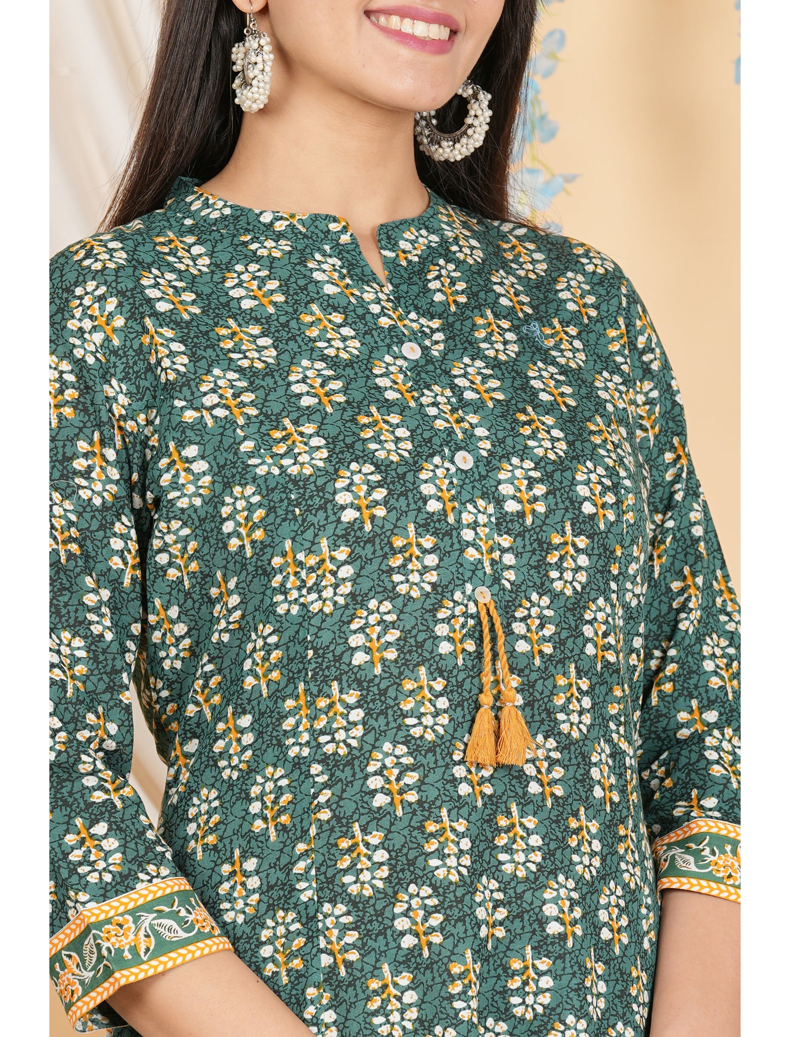 Maluka Women Rayon Floral Printed with Button and Tassel Straight Kurta