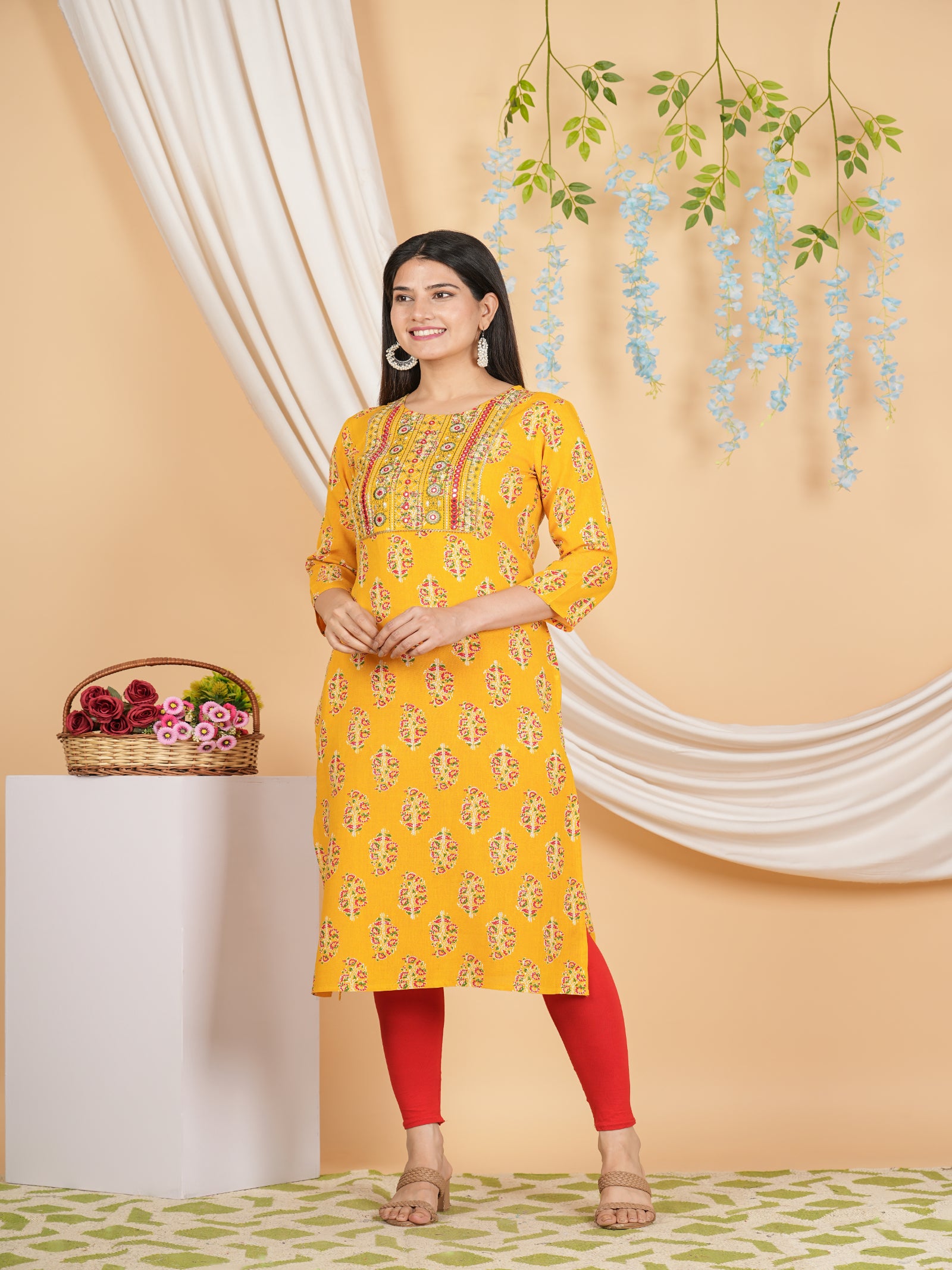 Maluka Women’s Yellow Floral Rayon Straight Kurta with Embroidery & Mirror Work