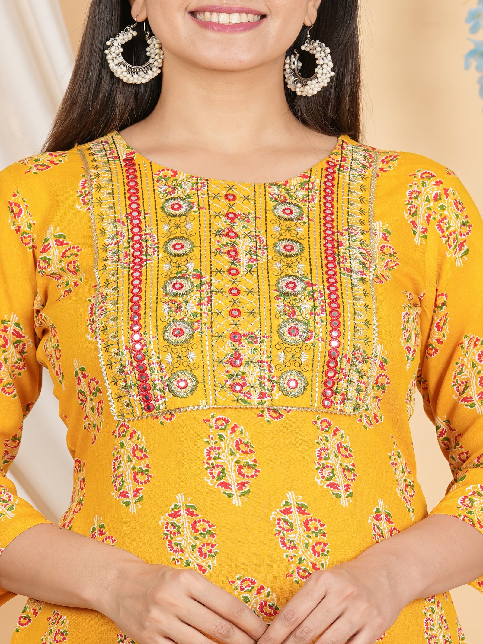 Maluka Women’s Yellow Floral Rayon Straight Kurta with Embroidery & Mirror Work