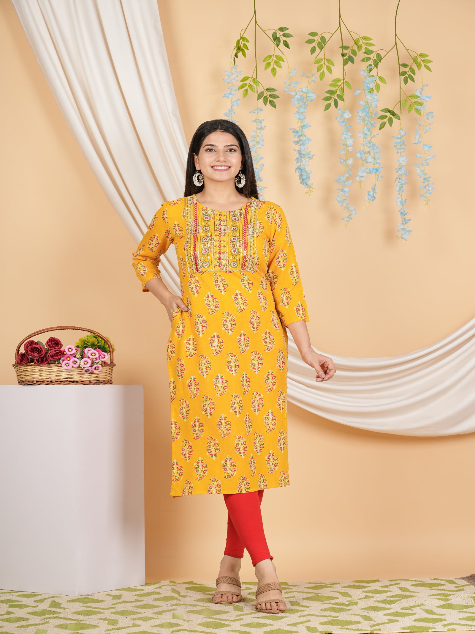 Maluka Women’s Yellow Floral Rayon Straight Kurta with Embroidery & Mirror Work