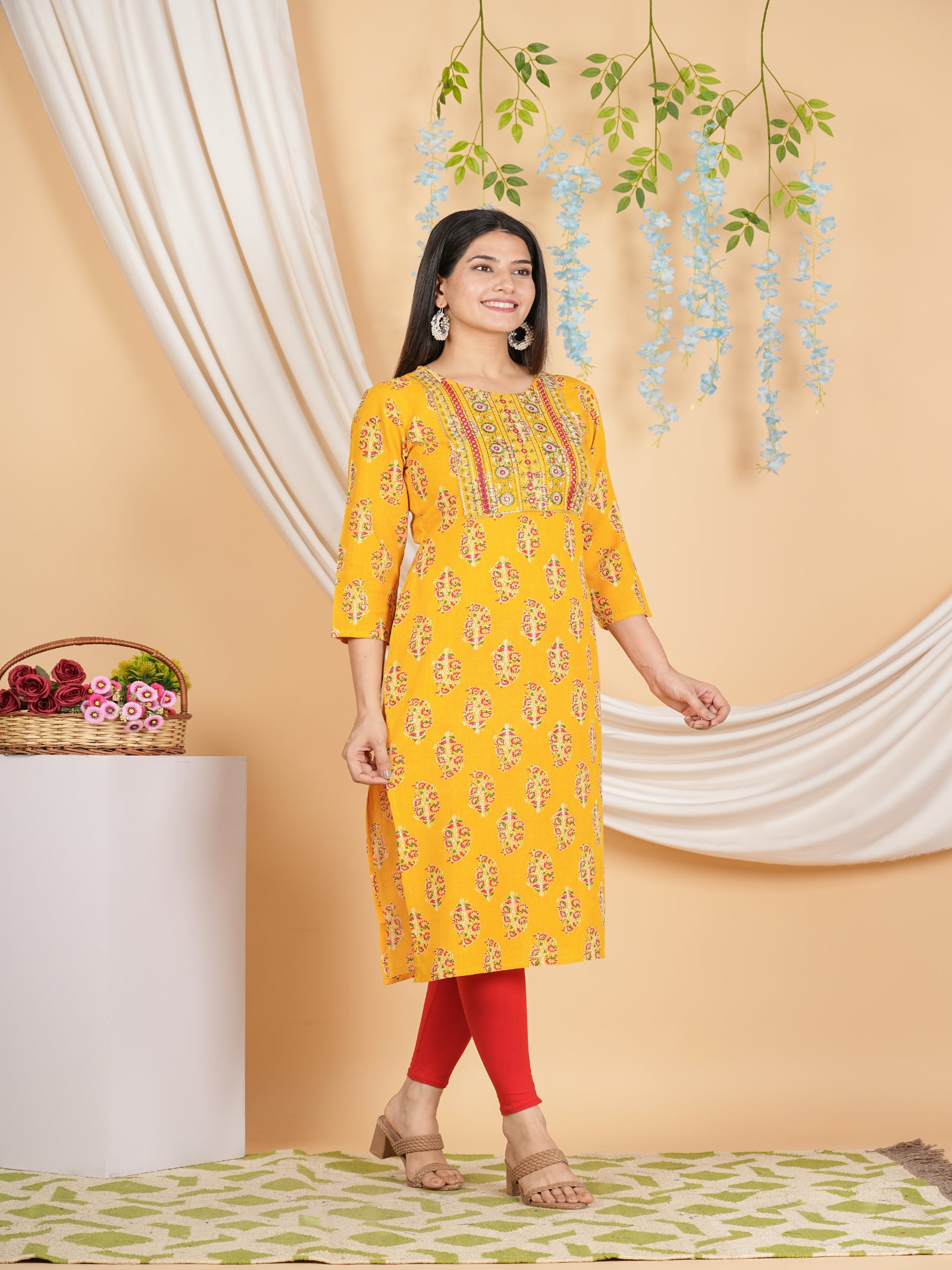 Maluka Women’s Yellow Floral Rayon Straight Kurta with Embroidery & Mirror Work