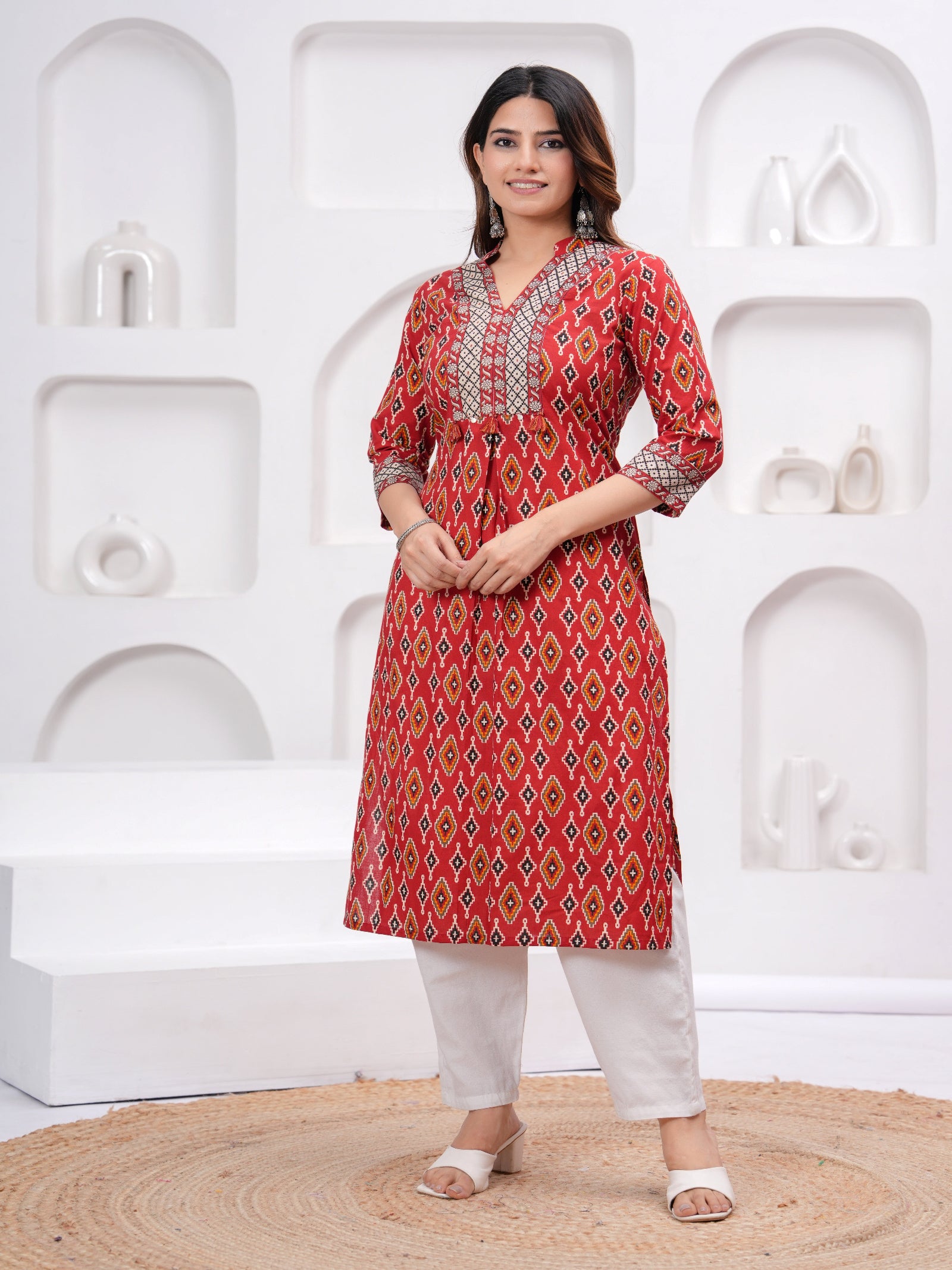 Maluka Women Maroon Cotton Printed Kurta Set.