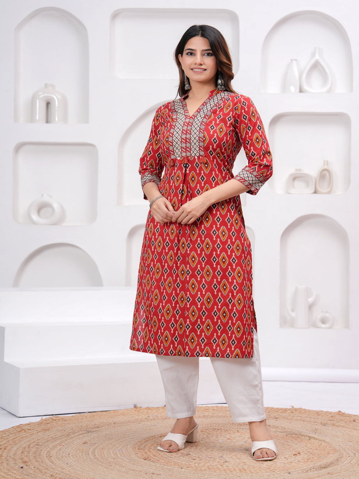 Maluka Women Maroon Cotton Printed Kurta Set.