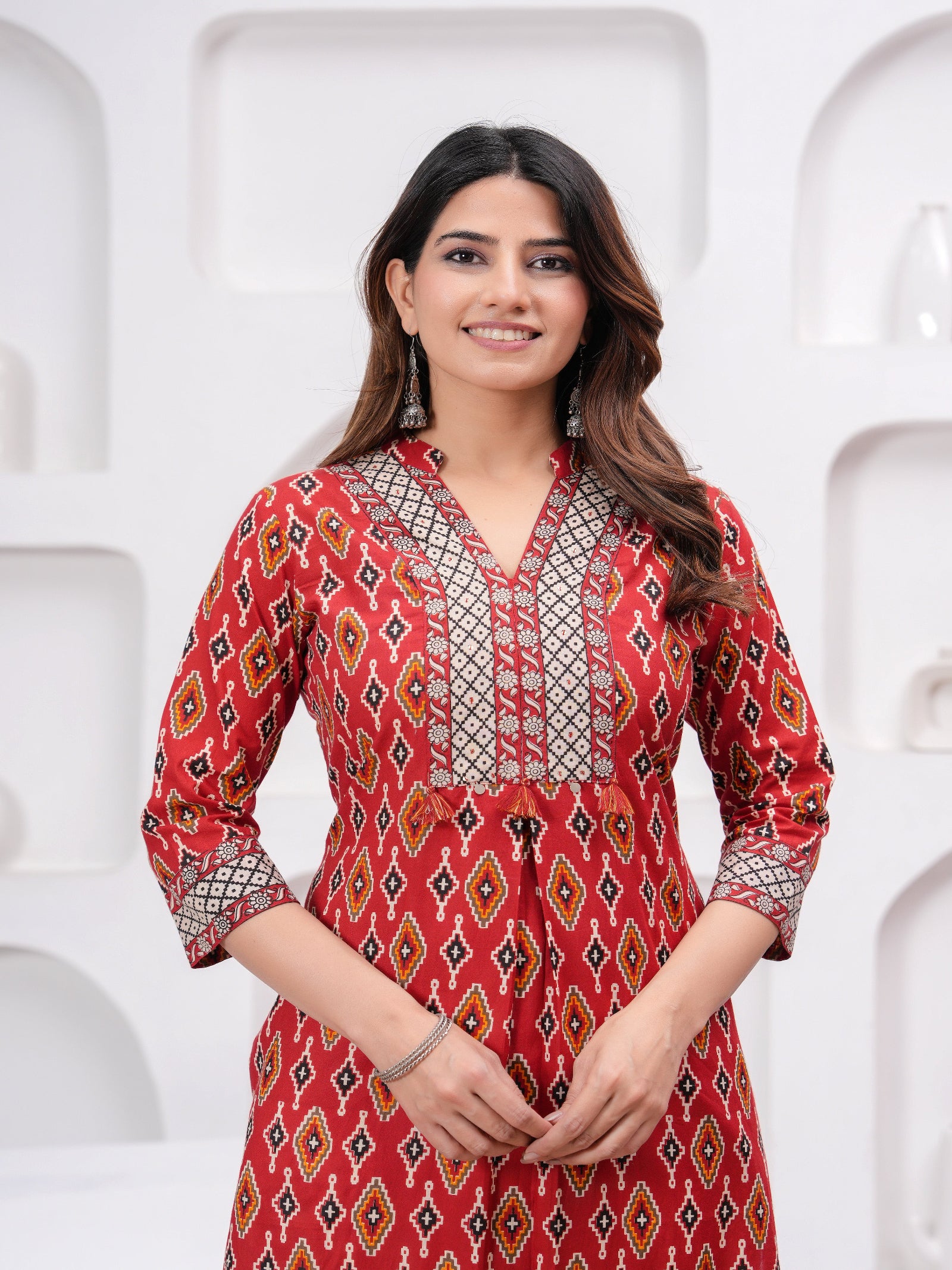 Maluka Women Maroon Cotton Printed Kurta Set.